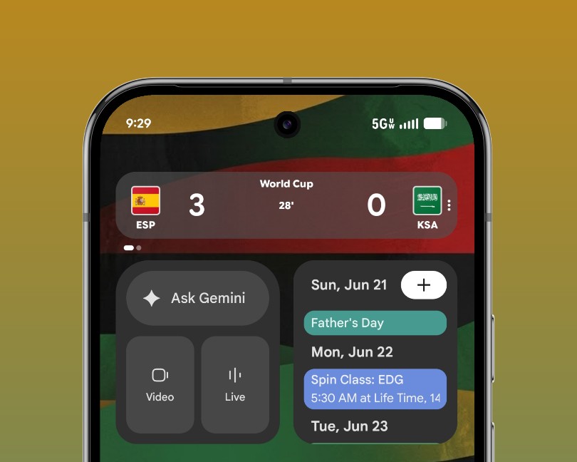 Google Pixel home screen with the Spain vs. Saudi Arabia score 3-0